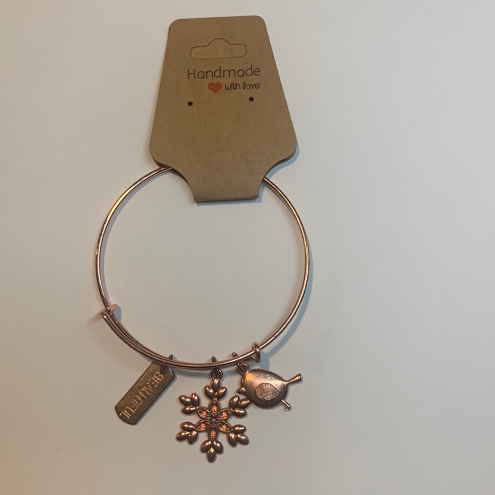 Handmade Rose gold stainless steel bracelet with 3 charms.